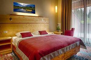 Slovenija Hotel Natura Rogla postelja