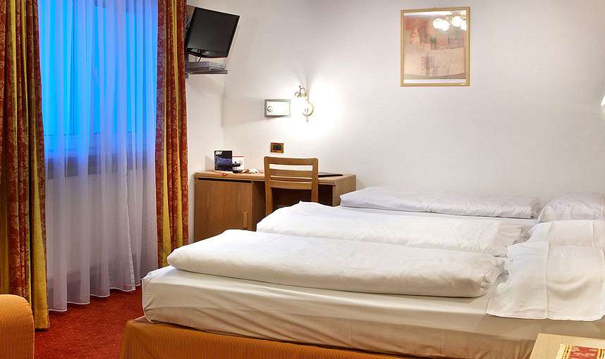 Hotel Malita - Arabba - SKIFUN - postelja s počivalnikom