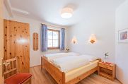Apartmajska hiša Vital Schladming - SKIFUN - spalnica z zakonsko posteljo
